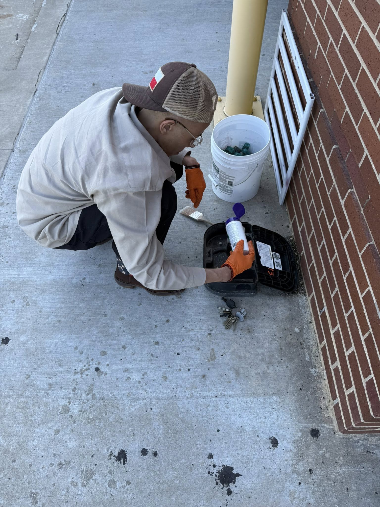 Employee working outside with pest extermination