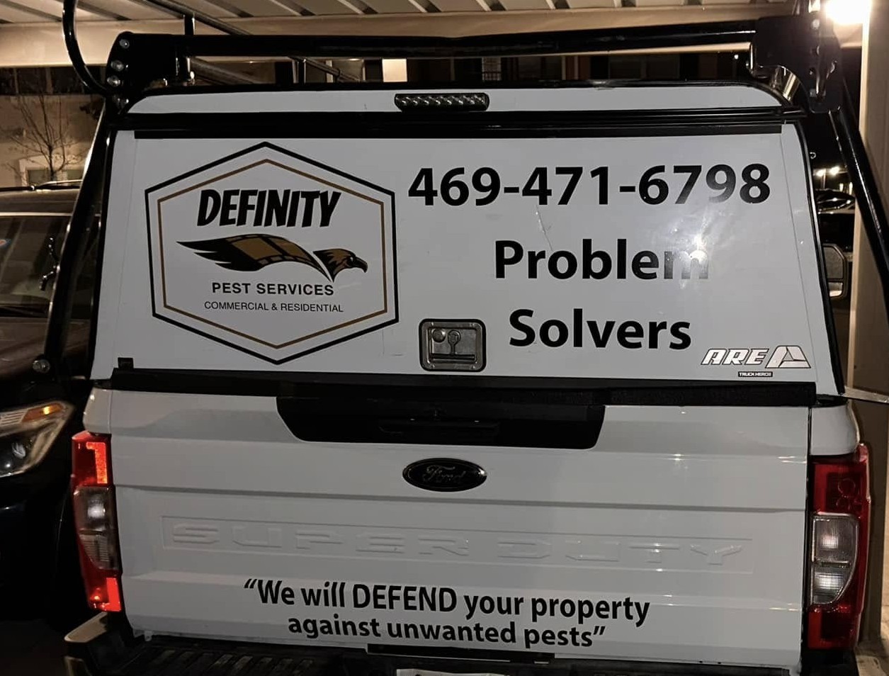 Definity Pest Services work truck — eagle-branded fleet