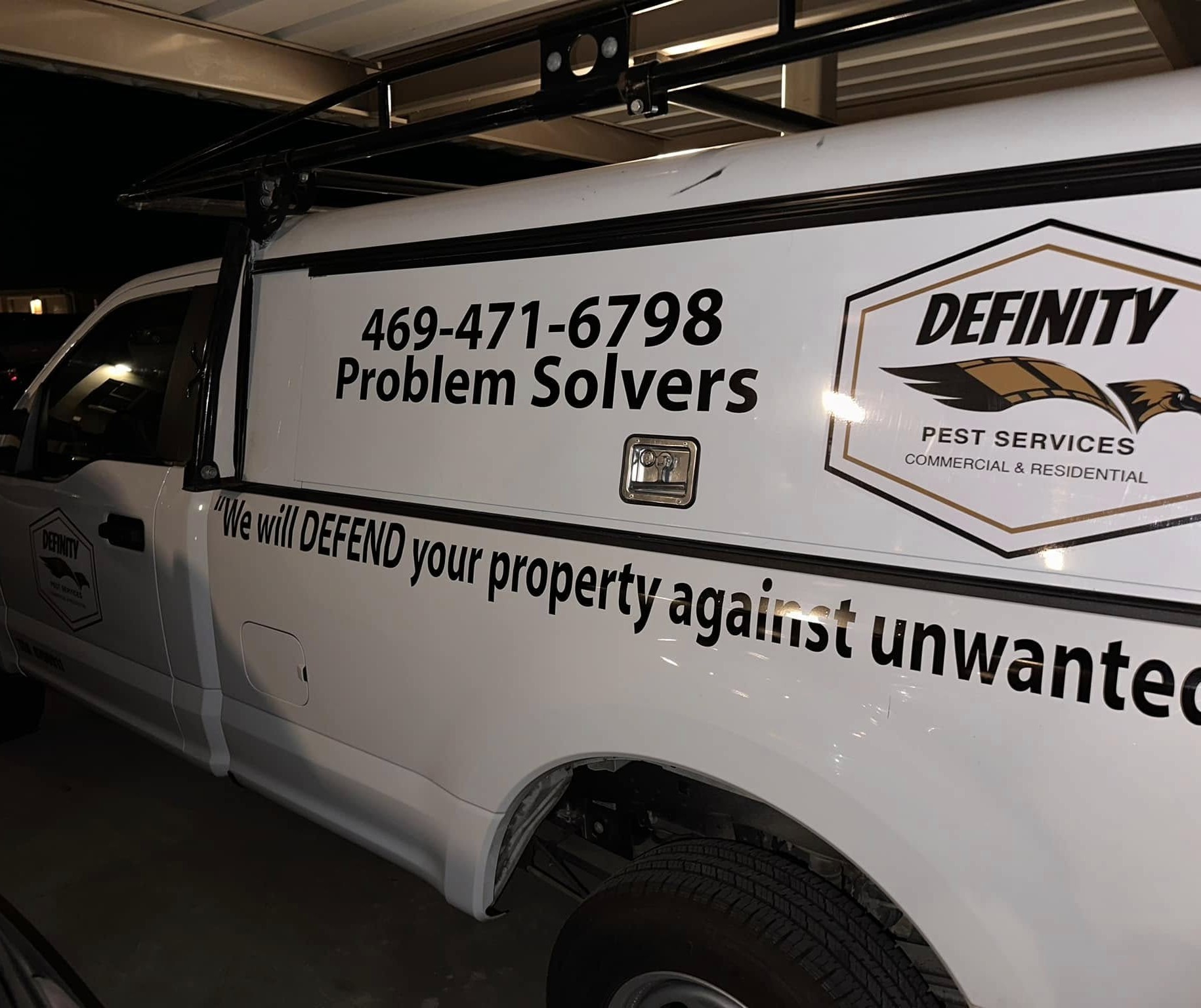 Definity Pest Services work truck — eagle-branded fleet